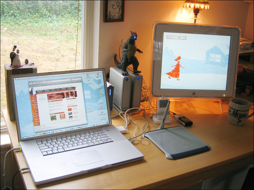 laptop and mac computer in use